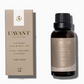 A box and a bottle of L’Avant Collective Ambre Santal Collection fragrance oil, both labeled with product details in English and French.