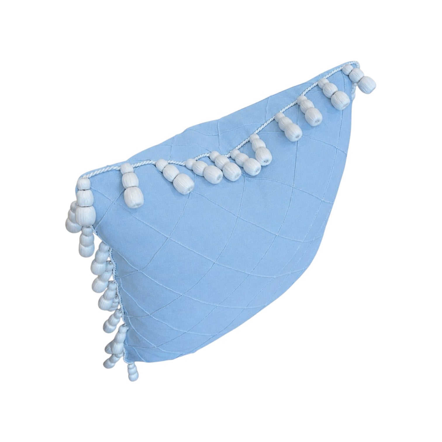 The Feroe Pillow by Hive Custom Pillows features light blue quilting and a diagonal row of small blue-and-white tassels—crafted from premium materials for those who value luxurious comfort.