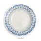 A Fine Bone China soup bowl from the Azure Blue Dinnerware Collection by Pink House Mustique, featuring a blue geometric and floral rim pattern, custom made and photographed from above on a white background.