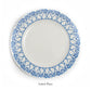 The Azure Blue Dinnerware Collection by Pink House Mustique features a round white salad plate in fine bone china with a blue geometric and floral border, shown from above on a plain white background.