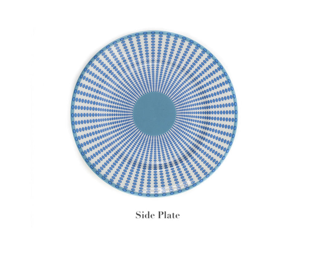 The Azure Blue Dinnerware Collection by Pink House Mustique features a round side plate in fine bone china with a blue and white concentric dotted design, labeled "Side Plate" below the image.