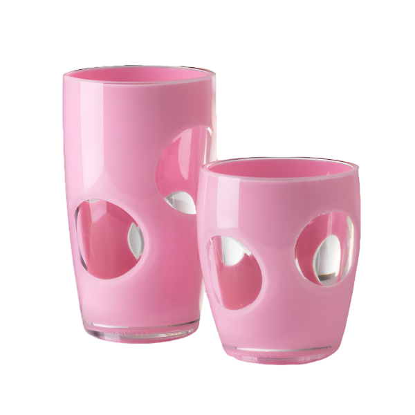 The Mario Luca Giusti Fisheye Acrylic Drinkware Collection features two pink tumblers, one tall and one short, with bold fisheye cutouts—ideal for outdoor table settings.