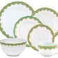 The Herend Fish Scale Evergreen Collection by Herend is a white dinnerware set adorned with green and gold decorative trim, featuring plates of various sizes, a bowl, and an elegant hand-painted teacup with a handle—perfect as an anniversary gift.