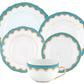 The Herend Fish Scale Turquoise Collection is a five-piece porcelain set featuring blue and gold patterned rims, four assorted plates, and a hand-painted matching teacup.