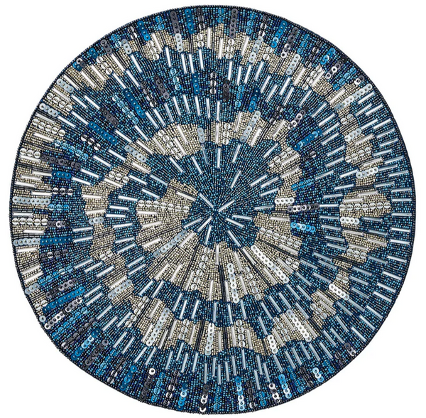 Circular mosaic pattern composed of various electronic components, forming an abstract design Kim Seybert Illusion Placemat in Midnight and Silver.