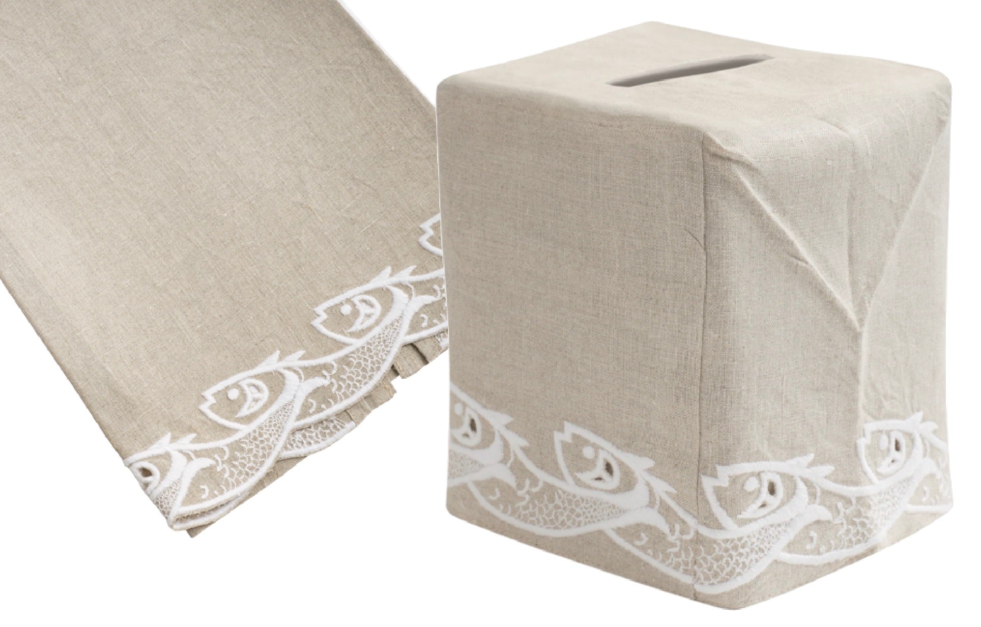 The Scrollfish Bath Collection by Haute Home, featuring Italian linen items in white on flax, showcases exquisite hand-embroidered white fish along the edges.