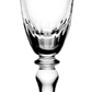 The Claire Collection by William Yeoward Crystal features a handmade wine glass with decorative etching near the rim and a faceted stem—perfect as elegant bridal or tableware, shown against a white background.