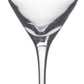 A clear wine glass from the Simon Pearce Vintner Drinkware Collection, featuring a long stem and wide base inspired by Napa Valley winemakers, shown on a white background.