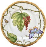 The Anna Weatherley Wildberries Salad Plate features hand-painted grape leaves, red berries, a blue butterfly, and a flying insect on white porcelain with a gold rim.