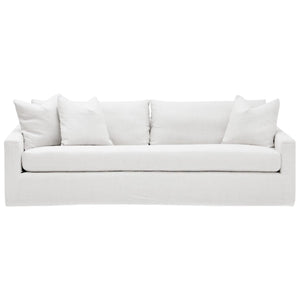 The Duke Sofa by Verellen is a modern white three-seater made from sustainably harvested hardwood, featuring straight edges, a hand-tied seat for comfort, and four matching cushions.