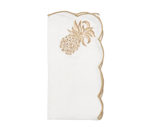 The Pina Punch Napkin Set by Kim Seybert features white linen napkins with gold scalloped edges and an embroidered gold pineapple, perfect for elevating any table setting.