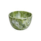 The Nashi Home Serveware Collection, Forest, features a green and white marbled ceramic bowl with a rounded shape—ideal as a distinctive serving piece or accent for your home decor. Shown on a white background. Brand: Nashi Home.