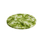 The Nashi Home Serveware Collection Forest cutting board, crafted from BPA-free resinware in a round green and white marbled design with a handle slot, is shown on a white background.
