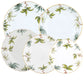 Five Herend Foret Garland Collection porcelain plates, featuring scalloped edges, gold rims, and hand-painted green botanical designs, are artfully arranged overlapping against a white background.