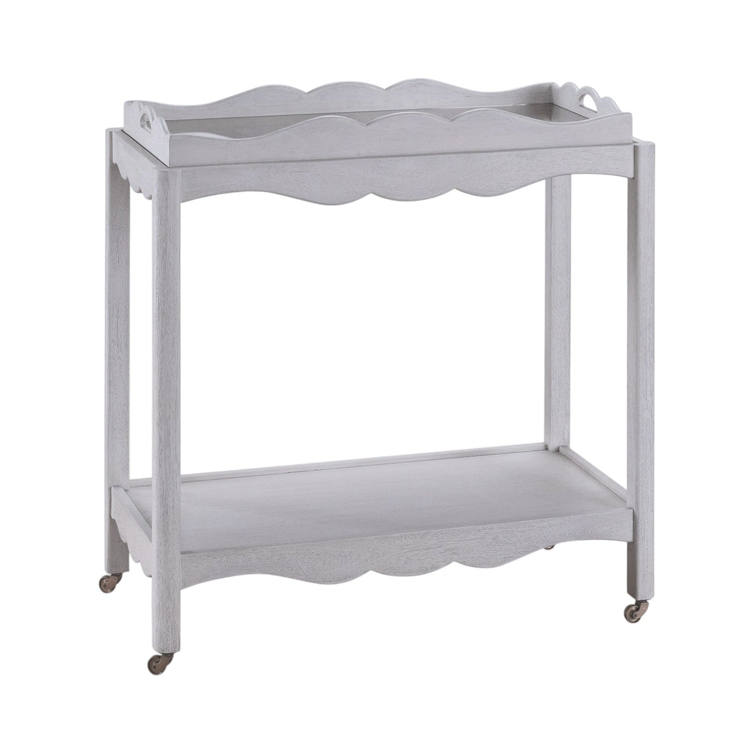 The Lawson Bar Cart by Branch Home features two white wooden tiers with scalloped edges, a magnetic tray, and four small caster wheels—perfect for serving drinks.