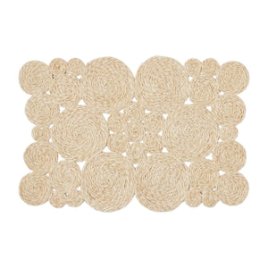 The Francine Placemat by Blue Pheasant is a rectangular mat made of natural abaca fibers with a grid pattern of coiled circles in various sizes.