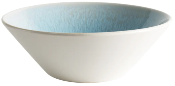 The Jars Vuelta Ocean Blue Collection features a white ceramic bowl with a light blue ocean glaze interior, showcasing timeless elegance against a white background.
