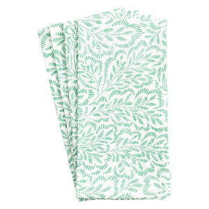 Handcrafted from cotton, Caspari’s Block Print Leaves Napkin Collection features a green leafy pattern on white, celebrating the elegance of Indian textiles.
