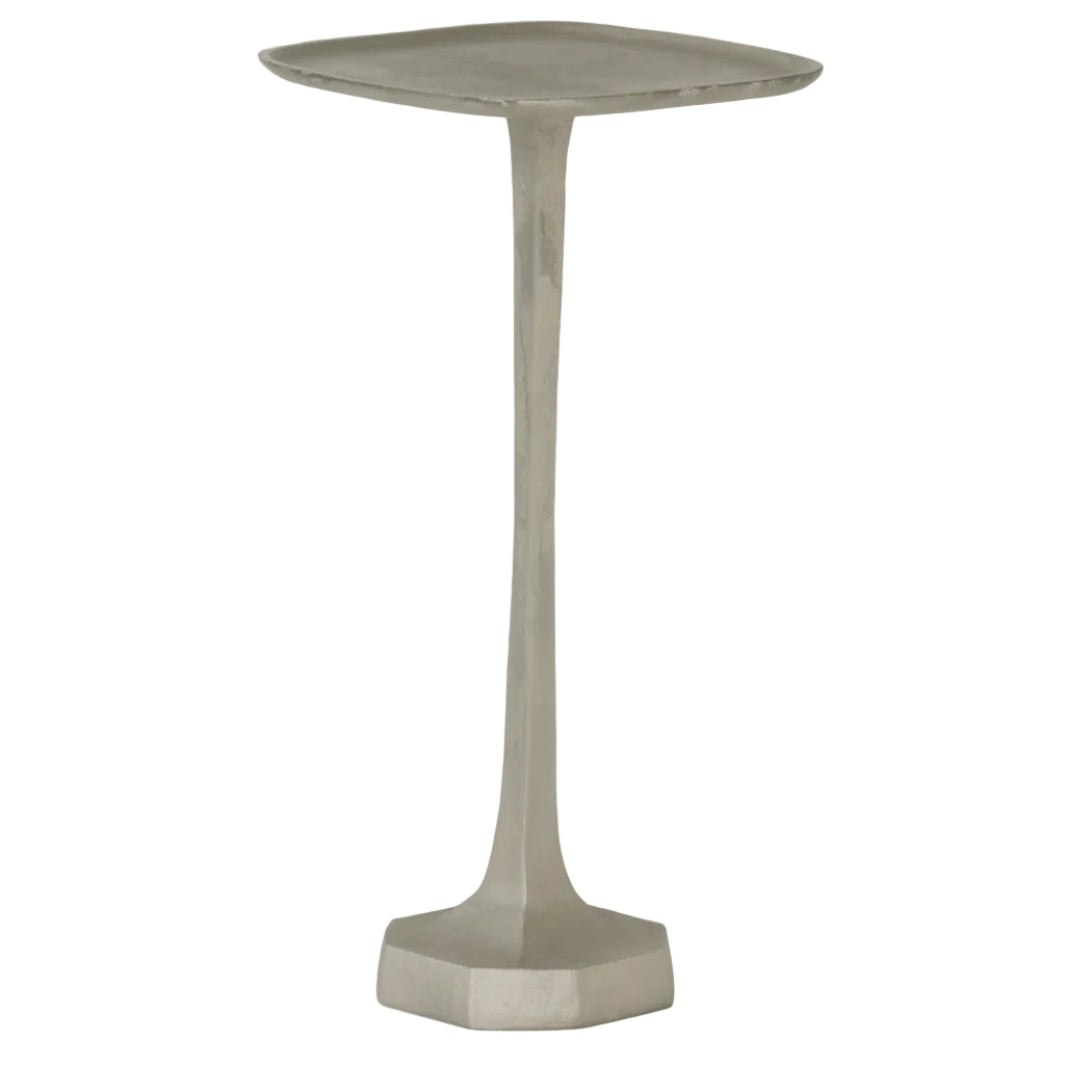 The Brenna Drinks Table by Made Goods features an antique silver textured metal finish, a square tray top, slender stem, and hexagonal base, shown against a white background.