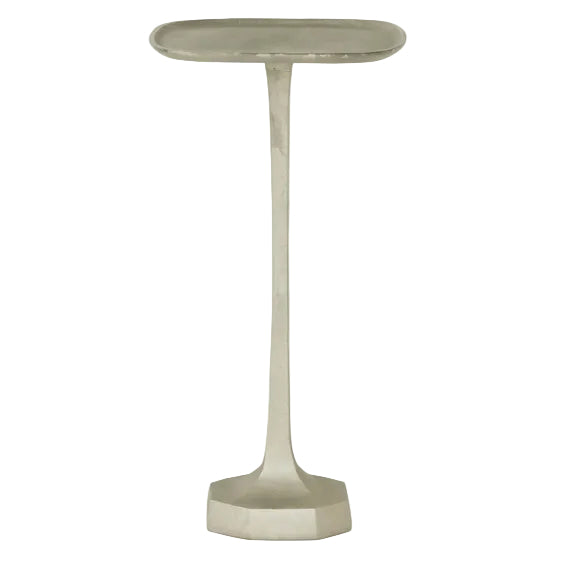 The Brenna Drinks Table by Made Goods features an antique silver finish, a tall and narrow metal design with a textured rectangular tray top, slender pedestal, and geometric hexagonal base.