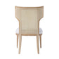 Modern Carleen Dining Chair by Made Goods with white cushion and cane backrest.