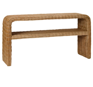 The Charlotte Console by Made Goods features a rectangular silhouette with rounded edges, a woven seagrass design, and an open lower shelf for added sophistication.