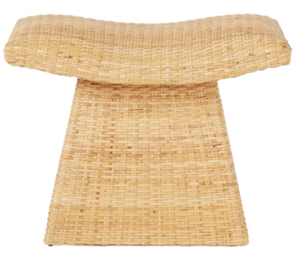 The Connie Foot Stool by Made Goods is a lightweight woven rattan foot stool with a wide, slightly curved seat and trapezoidal base, shown against a white background.
