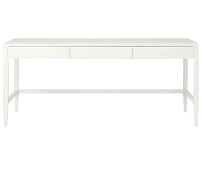 The Conrad Desk by Made Goods is a modern white desk with three front drawers and tapered legs, inspired by traditional Chinese consoles, shown against a plain white background.