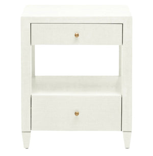 The Made Goods Conrad Nightstand is a white piece with modern proportions, two brass-knob drawers, an open middle shelf, and four short legs.