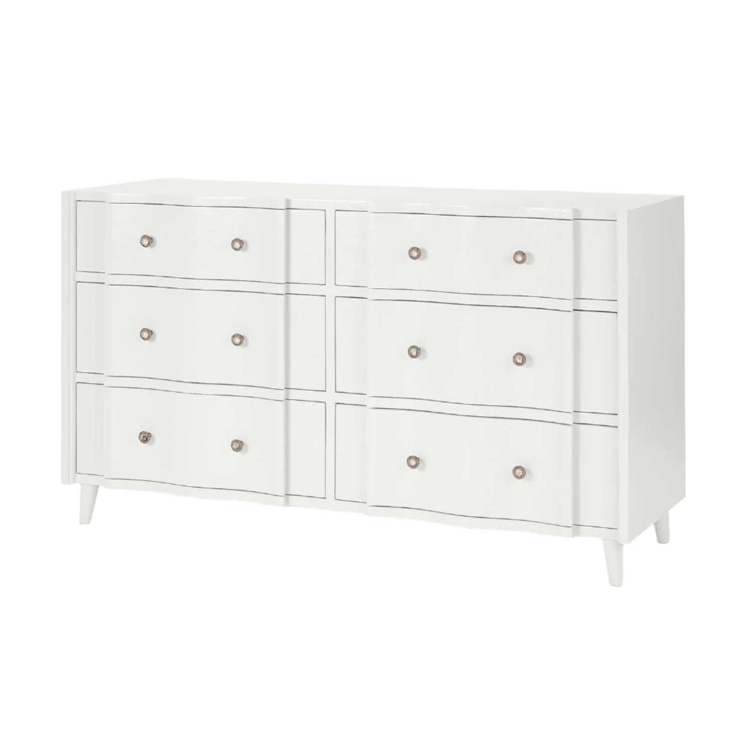 The Essery Dresser Collection by Made Goods features a white six-drawer dresser with silver knobs, gently curved fronts, tapered legs, and textured faux raffia accents for an elegant touch.