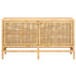 The Isla Buffet by Made Goods is a rectangular sideboard crafted from light-toned wood with woven rattan doors—an essential minimalist piece for stylish dining room storage.