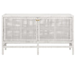 The Isla Buffet by Made Goods is a white, rectangular sideboard with rattan-cane doors, vertical legs, and brass handles—an elegant choice for dining rooms—shown against a plain background.