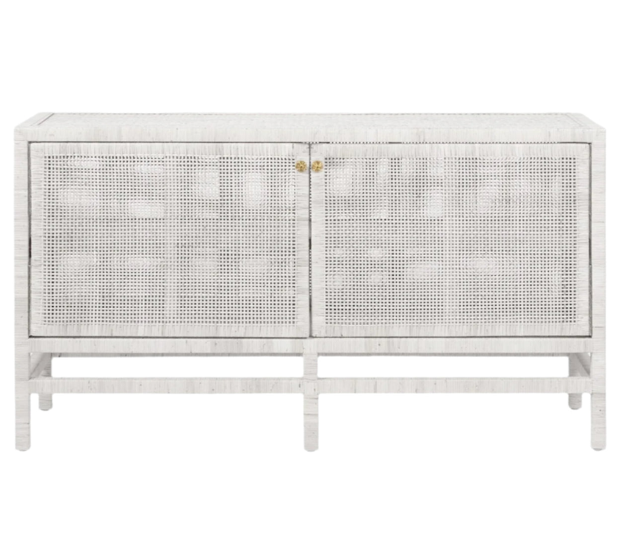The Isla Buffet by Made Goods is a white, rectangular sideboard with rattan-cane doors, vertical legs, and brass handles—an elegant choice for dining rooms—shown against a plain background.