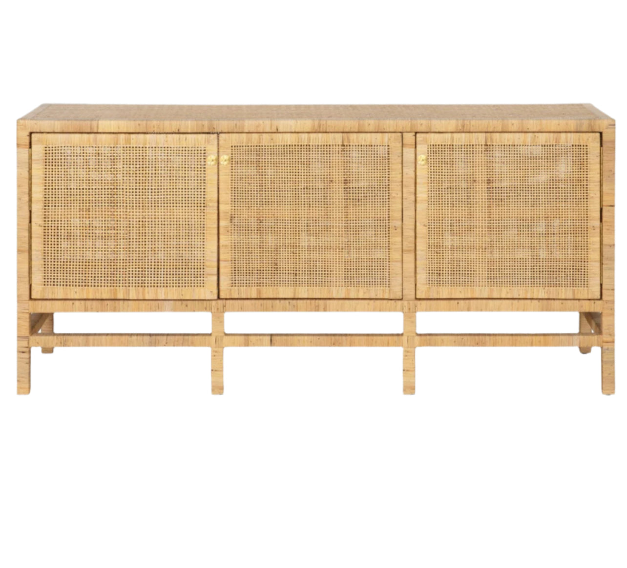 The Isla 3 Door Buffet by Made Goods features a light wood frame, three rattan-cane doors, and an open base—an elegant dining room essential—shown against a plain white background.