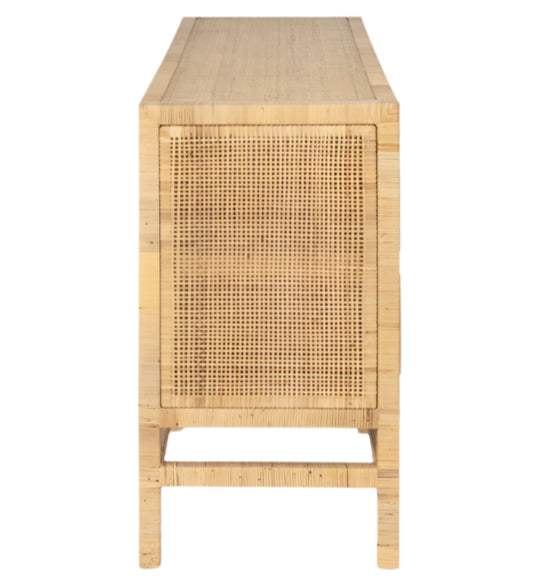 The Isla 3 Door Buffet by Made Goods showcases a rectangular wooden frame, straight legs, and chic rattan-cane doors—an elegant choice for modern dining rooms.