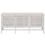 The Isla 3 Door Buffet by Made Goods is a white wooden sideboard with rattan-cane doors, minimal gold knobs, and short legs—ideal for storing your dining room essentials.
