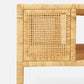 Close-up of the Isla Coffee Table by Made Goods, showcasing its woven wicker panel design, natural wood finish, and an extra lower shelf, all set against a white background.