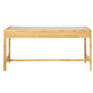 The Isla Desk by Made Goods features a rectangular wooden design with a glass top and basket weave rattan detailing, shown against a white background.
