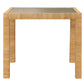 The Isla Game Table by Made Goods is a square rattan table with four straight legs, a natural rattan frame, and a glass top, shown against a white background.