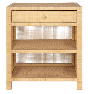 The Isla Nightstand by Made Goods is a square piece crafted from natural peeled rattan, featuring a soft-close drawer with a flower-patterned gold knob, two open shelves, and a woven cane back panel for added elegance.