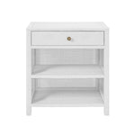 The Isla Nightstand Collection by Made Goods features a white nightstand with a basket weave texture, soft-close top drawer with round pull, and two open shelves below.