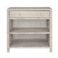 The Made Goods Isla Nightstand Collection features a light gray wicker nightstand with basket weave design, one drawer with two round knobs, and two open lower shelves.