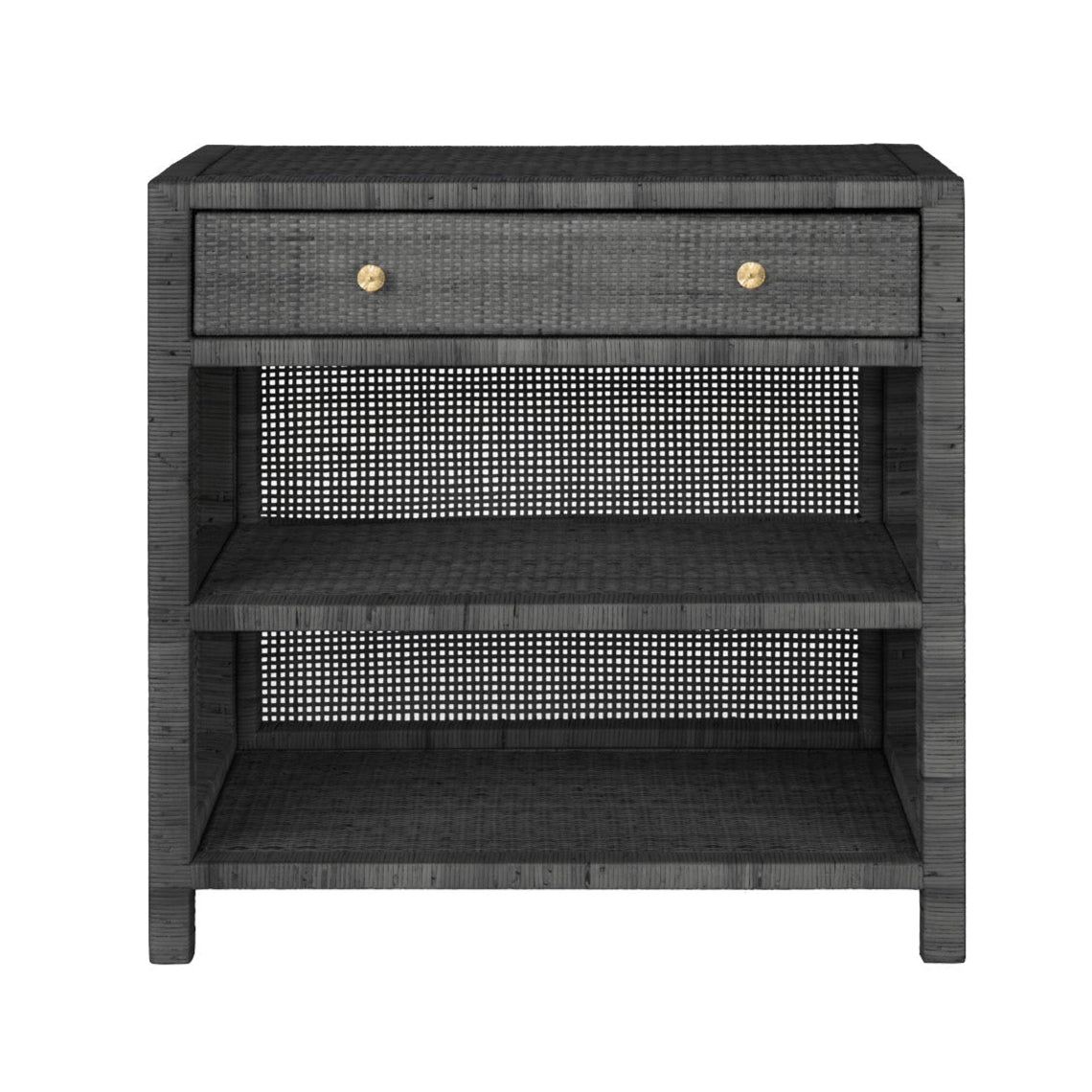 The Isla Nightstand Collection by Made Goods features a dark gray woven nightstand with a soft-close drawer with two round knobs and two open shelves below.