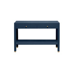 The Made Goods Jarin Console Collection features a blue rectangular table with two drawers, gold knobs and feet, a lower shelf, and a faux Belgian linen textured finish for subtle elegance against a white backdrop.