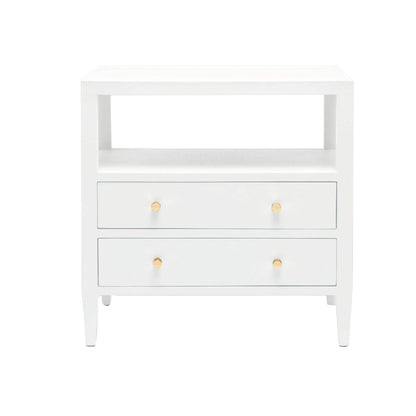 The Jarin Nightstand Collection by Made Goods features quality white wood craftsmanship, an open top shelf, and two lower drawers with double round gold knobs.