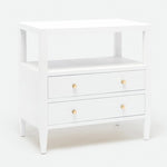 The Jarin Nightstand by Made Goods is a white wooden piece with two drawers featuring round knobs, an open shelf above, and quality craftsmanship for lasting appeal.