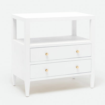 The Jarin Nightstand by Made Goods is a white wooden piece with two drawers featuring round knobs, an open shelf above, and quality craftsmanship for lasting appeal.