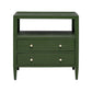 The Jarin Nightstand Collection by Made Goods features a green wooden nightstand with two drawers on European glides, an open shelf, four legs, and round brass knobs—showcasing quality craftsmanship in every detail.