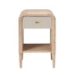 The Pierre Nightstand Collection by Made Goods features a wooden nightstand with a rounded frame, single drawer with gold-colored handle, and an open lower shelf, all accented by smooth, rounded edges.