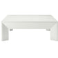 The Roberts Coffee Table by Made Goods is a rectangular, minimalist white table with uniquely shaped legs and a flat top, shown against a plain white background.